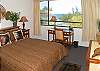 The oceanfront master bedroom has a queen bed.