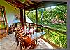 Enjoy your meals in the garden view, screened dining room and warm yourself on cool Hawaiian mornings with the small, electric fireplace.