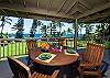 The lanai just outside the Great Room is a great place to relax, have a meal, and enjoy the view.