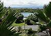Mauna Loa Shores is surrounded by water: this is a view on the front side of the building, with Mauna Kea in the distance.