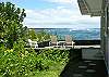 Sunrise House has a large deck that's perfect for sunbathing. It's so private you can feel free to even-out your tan!