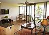 When you step into Kihei Surfside 510, you know you're not in a "cookie cutter" condo. This unit has an elegant tropical style -- comfortable with tasteful decorator touches -- and this beautiful room opens to one of the nicest oceanfront views around.