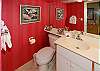The extra half bath off the hall is a convenient feature of the larger one-bedroom Surfside condos.