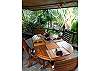 Enjoy your meals surrounded by natural splendor at the covered dining area overlooking the water.