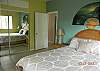 The downstairs unit has two great bedrooms, each with a wall mounted TV, closet and dresser.