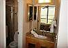 Both bathrooms upgraded with elegant granite counter tops and tiled shower.