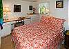 The second upstairs bedroom has a queen bed and child's loft above the closet.