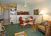 A built-in desk for your laptop and papers keeps the gorgeous wicker dining room table available for enjoying a meal inside. Free high-speed Internet is included.