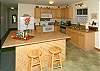 The brand new fully equipped kitchen in the Ohana has everything you'll need for meals and a large breakfast bar for convenience.