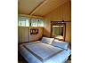One of the two bedrooms with king beds in the bedroom pavillion at Shangri-La.