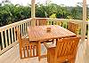 The large wraparound lanai has beautiful teak furnishings for dining. There are also teak lounge chairs for relaxing with a good book and enjoying the warm tropical breezes.