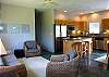 The open floor plan makes cooking and relaxing fun and easy.