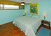 The second bedroom offers a queen bed and a view of the Kilauea volcano.