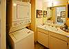 D-516 has a compact bathroom with a tub shower and you have a convenient laundry center inside the condo.