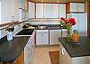 A closeup of Surfside 405's fully equipped kitchen. You won't find this in a hotel!