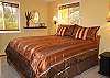If you prefer a large king bed with satin bedding, try the first floor bedroom!