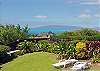 Daytime views encompass the Big Island's mountains and neighbor island Maui.