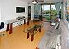 The glass desk makes a wonderful work station, or relax and watch the flat screen TV!