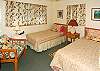 The third upstairs bedroom has twin beds.