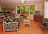 The owners of Hula Cove have made good use of the living space with lots of sitting areas to enjoy the view or the flat-screen TV and DVD player.