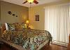 The master bedroom has a queen bed, en suite bath, phone, and private oceanfront lanai. The other upstairs bedroom has two twin beds.