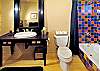 One of the five bathrooms. Nothing cookie-cutter here; all interesting but functional!
