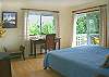 The master bedroom has a work space (with high-speed Internet) and a comfortable king bed.