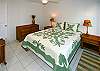 A beautiful Hawaiian quilt adorns the queen bed in the second bedroom.