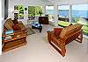 Take in the stunning ocean view through the living area's wall of windows.