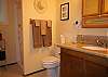All 3 Bathrooms at Mele Kohola are upgraded with granite countertops.  This is the first floor bath, upstairs has the full bathtub bathroom.