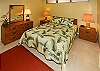 A queen bed awaits you after your day playing on the beach!