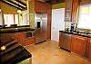 The open kitchen has everything you need to entertain and feed the senses!  Fully upgraded with stainless steel appliances, granite countertops and more!