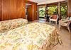 There are two more twin beds in the downstairs bedroom, which also has a nice garden view and easy access to the ocean.