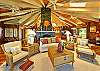 The Great Room provides a luxurious but comfortable place to visit, relax, and enjoy the view. The room has a radio/CD to keep you company, and when the sun goes down there are good reading lamps and a TV and DVD/VCR to entertain you.