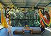 Fun hammocks on the lanai overlooking the waterfall and pond