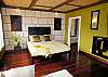 Sleep well in the King-sized bed of Master Suite One featuring quality linens and decor!  Closet has plenty of storage for your items.  An adjoining ensuite bath has your privacy and plenty of luxury in mind!