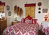 The second bedroom is off the lanai with a separate exterior entry from the rest of the house.