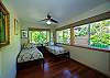 The Twin Bedroom has two twin beds and garden views.