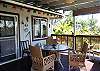 Enjoy dining, cocktails or game night on the covered lanai, just off the living room.