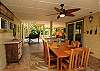 The outdoor, covered lanai offers a great place to eat after a long day in the sun.