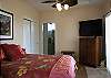 This bedroom offers a Queen bed, on-suite bathroom and flat screen TV.