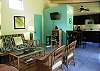Relax in the open Living room of Maka Lava Kai with flat screen TV and internet.