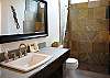 Gorgeous walk in shower in one of the two bathrooms.