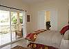 This bedroom offers a Queen bed, on-suite bathroom and flat screen TV.