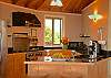 The kitchen has everything you need for cooking ono Hawaiian grinds including a gas range and stainless refrigerator.