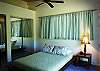The Front Bedroom also has a platform bed and garden views!