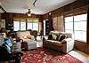 The living room in the old section of the house retains its "Old Hawaii" charm and comfort.