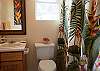 The Plumeria bedroom suite has a full bathroom with shower over tub.