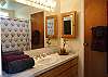 The Master Bathroom has an extra large walk-in shower and walk-in closet in case you need to unpack and stay a long while!
