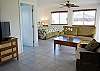 Downstairs Living Room and Bedroom suite is great for additional guests with King size bed and double sleeper sofa, TV and full bath.